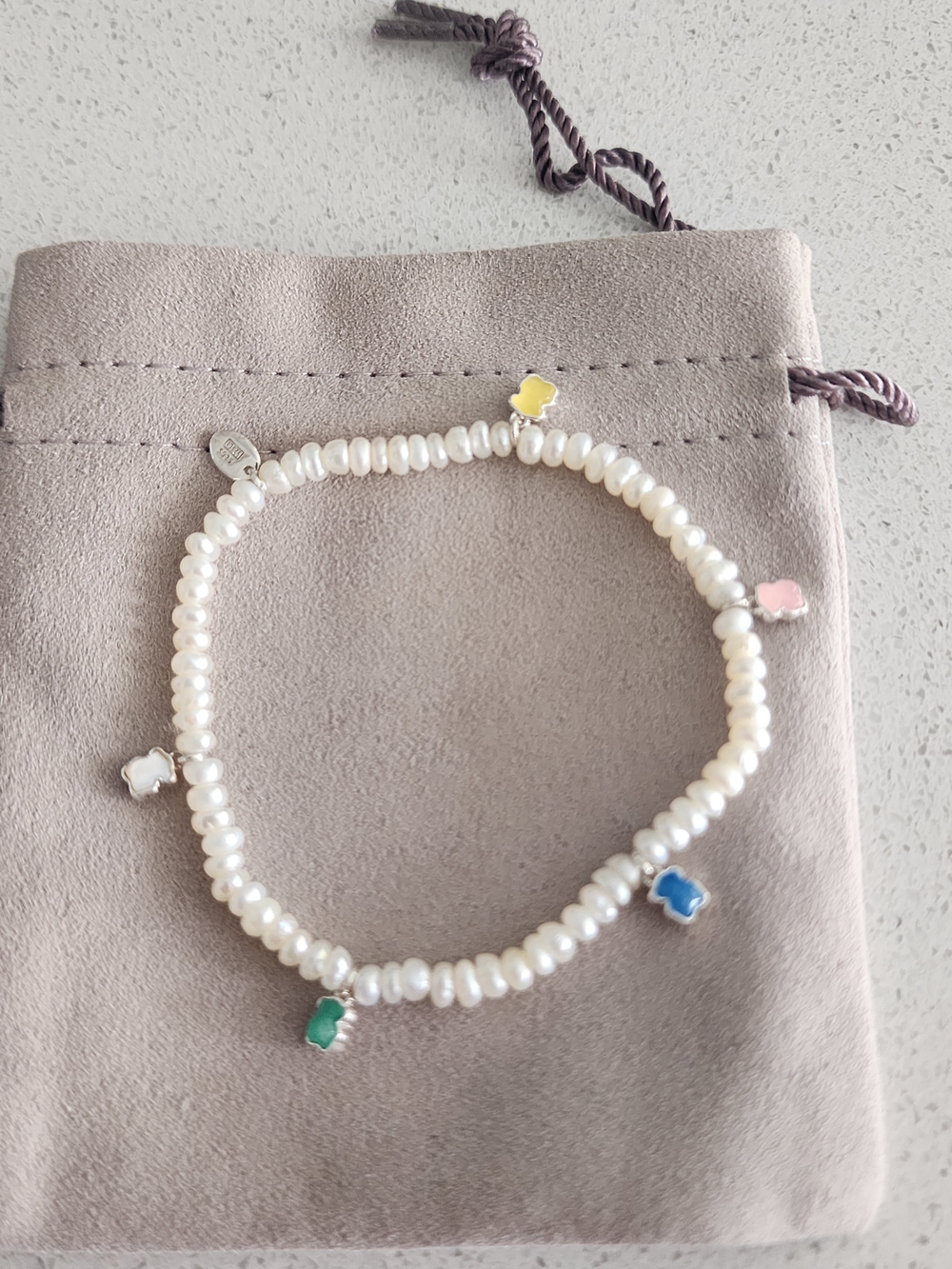 Tous White Pearl Bracelet with Pink, Blue, Green, Yellow & White Charms